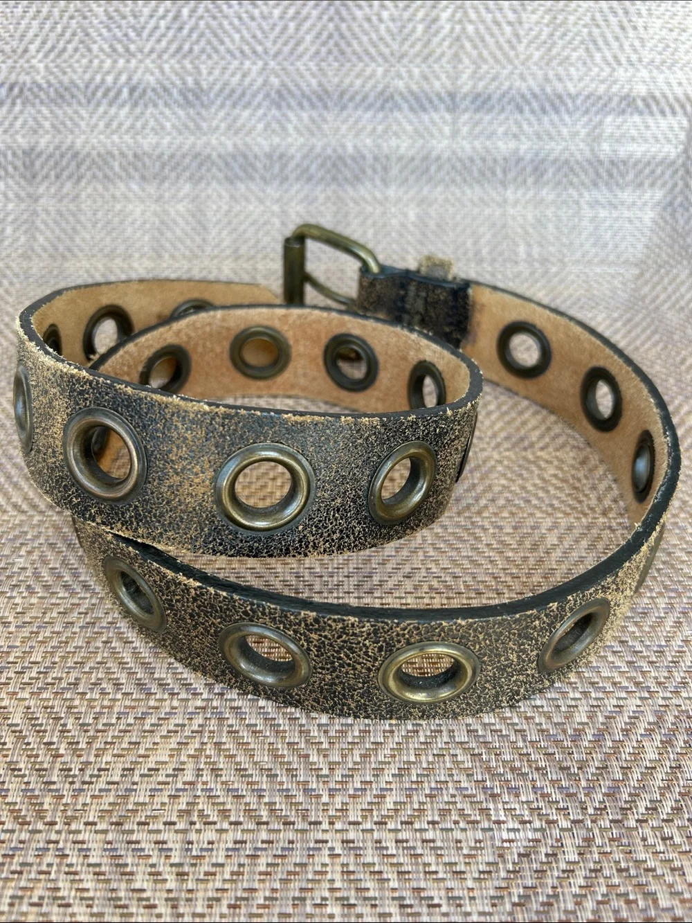 Women’s Vintage Distressed brown/tan Leather Grommet Belt. Size Small.